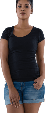 young woman wearing black shirt and denim shorts, standing with neutral expression. useful for design, fashion brands, casual clothing advertisements, promoting self-assured personalities, or as a character in digital media.