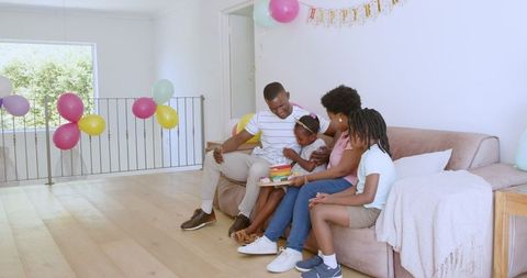 African American Family Celebrating Birthday at Home