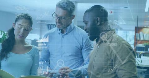 Team Analyzing Data in Modern Open Plan Office