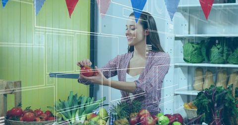 Smiling vendor arranging tomatoes at rustic market stall