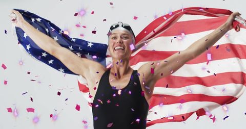 Triumphant Female Swimmer Celebrating with USA Flag