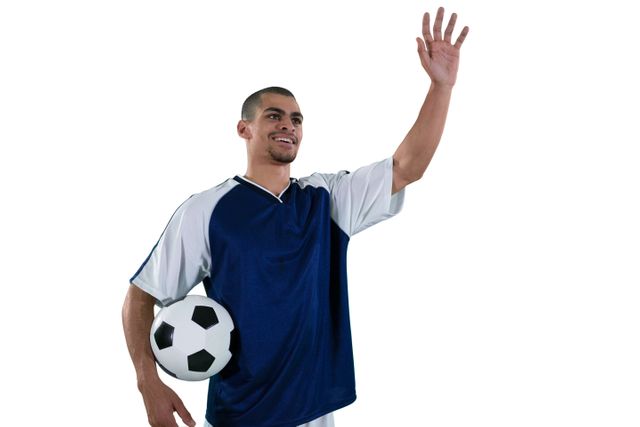 Football player waving his hand - Download Free Stock Photos Pikwizard.com