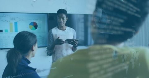 Businesswoman Presenting Data Analytics in Modern Office