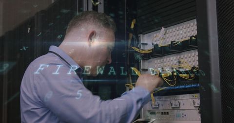 Engineer Managing Cybersecurity in Server Room - Download Free Stock Images Pikwizard.com