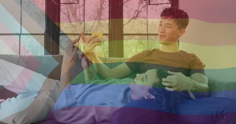 LGBTQ Couple Relaxing With Rainbow Overlay