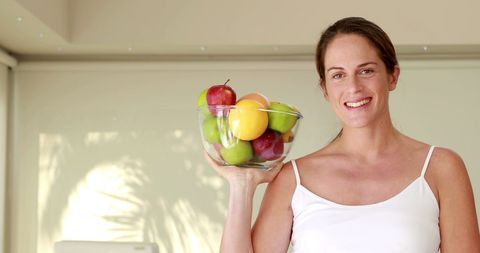 Pregnant Woman Holding Bowl of Fresh Fruits in Bright Kitchen - Download Free Stock Images Pikwizard.com