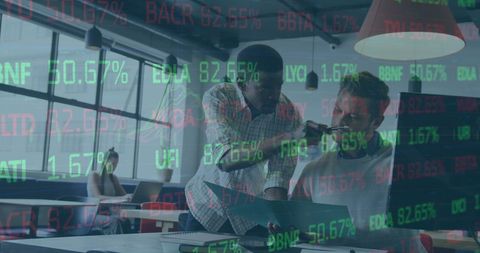 Business mentorship in modern office with financial data overlay