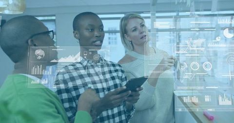 Team Collaborating with Data Projections in Modern Office Environment