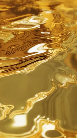 Rippling Golden Liquid Surface Shifting Dark Streaks Macro Vertical Cinematic Loop