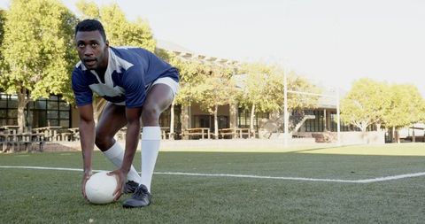 African american athlete training passion for soccer outdoors