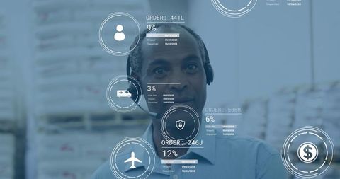 Logistics operator monitoring warehouse inventory dashboard with HUD overlays and headset