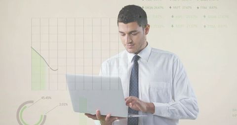 Businessman analyzing financial data on laptop with analytics overlays, charts, dashboard