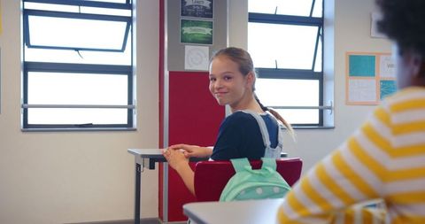 Diverse Classroom Setting with Engaged Students at Desks