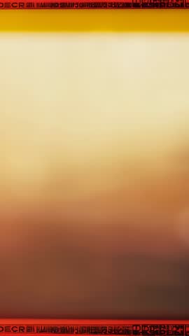 Vertical gradient display shifting with red overlay bars and retro film edge markings