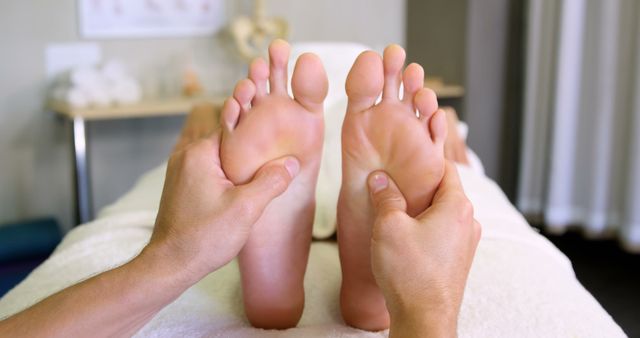 Therapist Massaging Relaxed Feet in Wellness Center - Download Free Stock Images Pikwizard.com