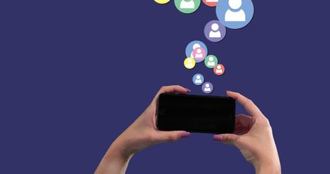Person Holding Smartphone with Floating Social Network Icons