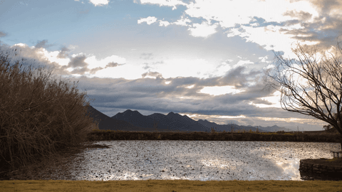 transparent mountain lake scenic view at sunset - Download Free Stock Videos Pikwizard.com