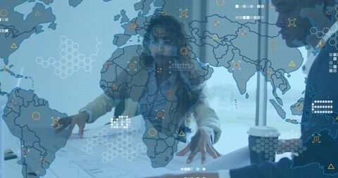 Business Team Analyzing Global Strategies with Data Visualization