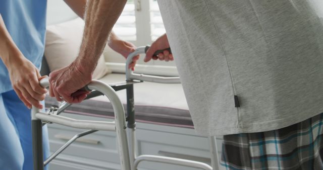 Male Patient Using Walker with Nurse Assistance in Rehabilitation Center - Download Free Stock Images Pikwizard.com