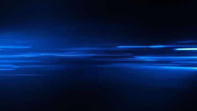 Cyan neon streaks streaming across dark gradient background for high-speed digital motion