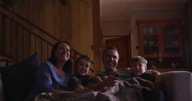 Family Watching TV Together at Home Living Room - Download Free Stock Images Pikwizard.com