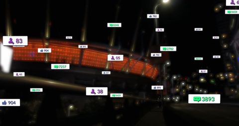 Digital social media icons overlay at night cityscape