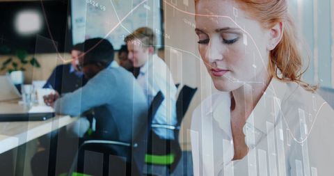 female executive analyzing financial charts on tablet in modern office - Download Free Stock Images Pikwizard.com