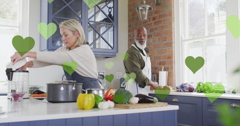 Happy Couple Cooking Enthusiastically Together at Home