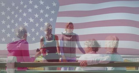 Group of women enjoying fitness and friendship on waterfront bench