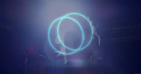 Singer Performing Live on Stage with Neon Light Effects