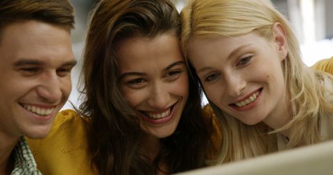 Group Celebrating Joyful Moment in Collaborative Activity