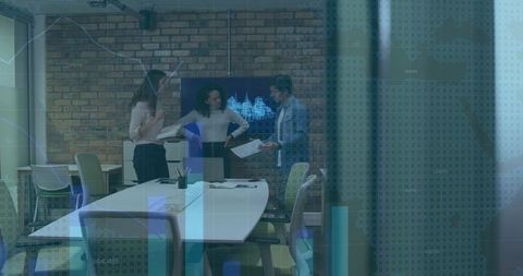 Team Discussing Strategy in Modern Conference Room with Glass Wall and Data Overlay