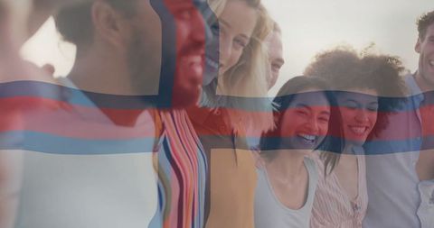 Multicultural friends embracing outdoors symbolizing unity