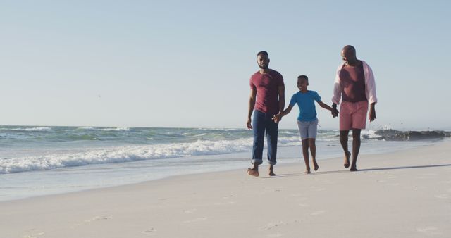 Family Strolling on Beach Enjoying Summer Vacation - Download Free Stock Images Pikwizard.com