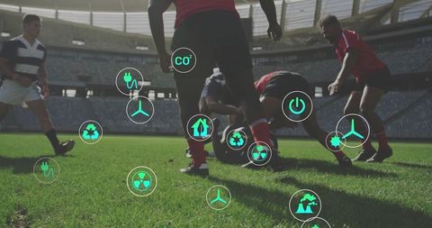 Rugby players competing on stadium pitch with green energy icons overlay, teamwork action