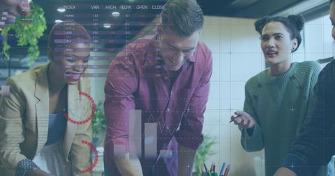 Team Collaborating with Financial Data Analysis in Modern Office