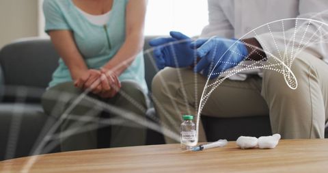 Doctor and Patient Consultation with Digital DNA Strand Overlay