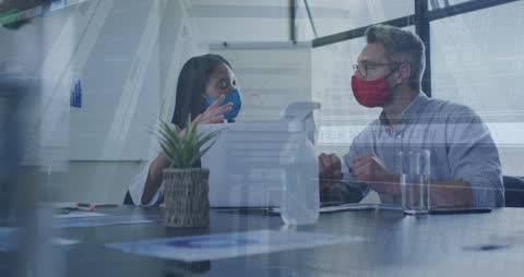Diverse Business Colleagues Collaborating with Masks during Pandemic