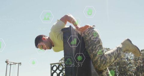 Man vaulting obstacle on outdoor course with ar interface