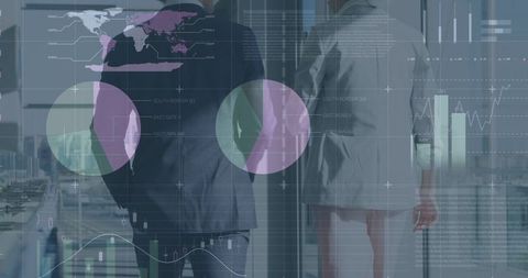 Back View of Business Colleagues Analyzing Financial Data Projections