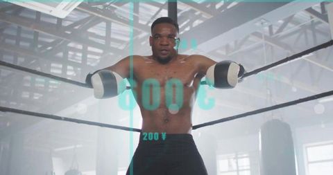 Shirtless boxer leaning on ropes with digital overlay in gym