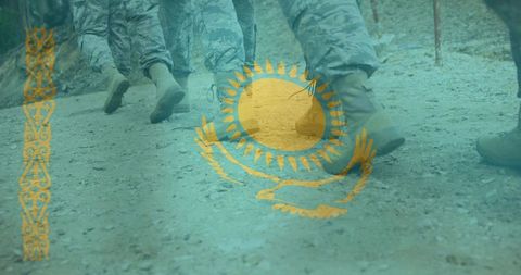 Marching military boots and camo trousers with kazakhstan flag overlay for patriotism