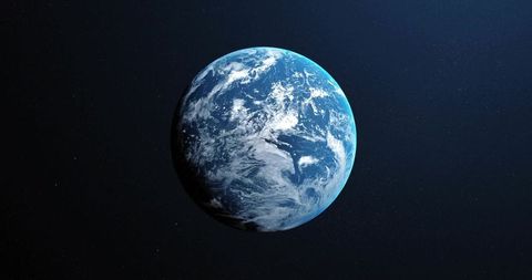 Planet earth in deep space with swirling clouds and oceans