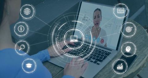 Typing on Laptop During Video Call with Digital HUD Overlay for Remote Collaboration