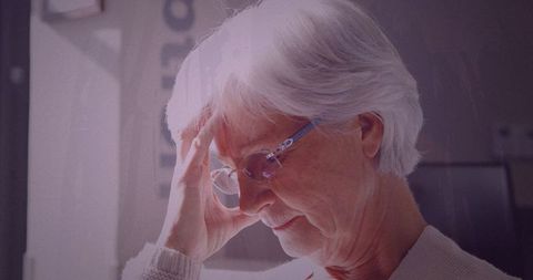 Senior woman facing stressful moment indoors