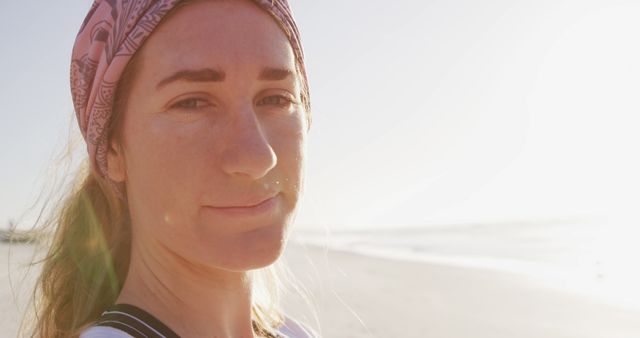 Young Woman on Sunny Beach with Headscarf - Download Free Stock Images Pikwizard.com