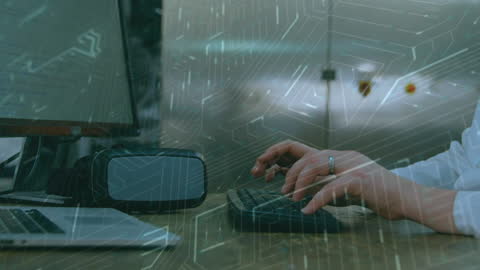 Businessman Typing at Computer with Digital Network Overlay