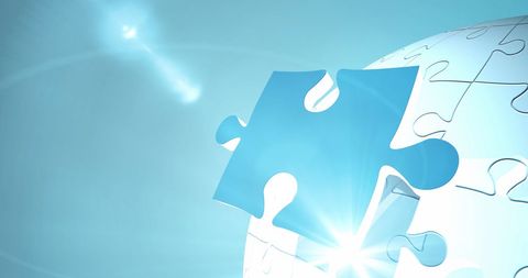 Shimmering Blue Puzzle Piece on Radiant Background - Download Free Stock Images Pikwizard.com