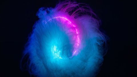 Neon Fiber Orb Floating in Dark Space with Cyan Core and Magenta Luminous Arc