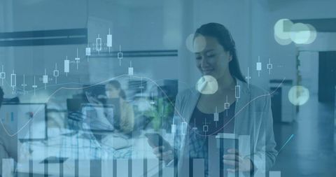 Business professional analyzing data with technology in modern office